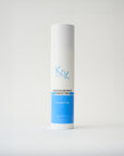 white and blue bottle of facial toner