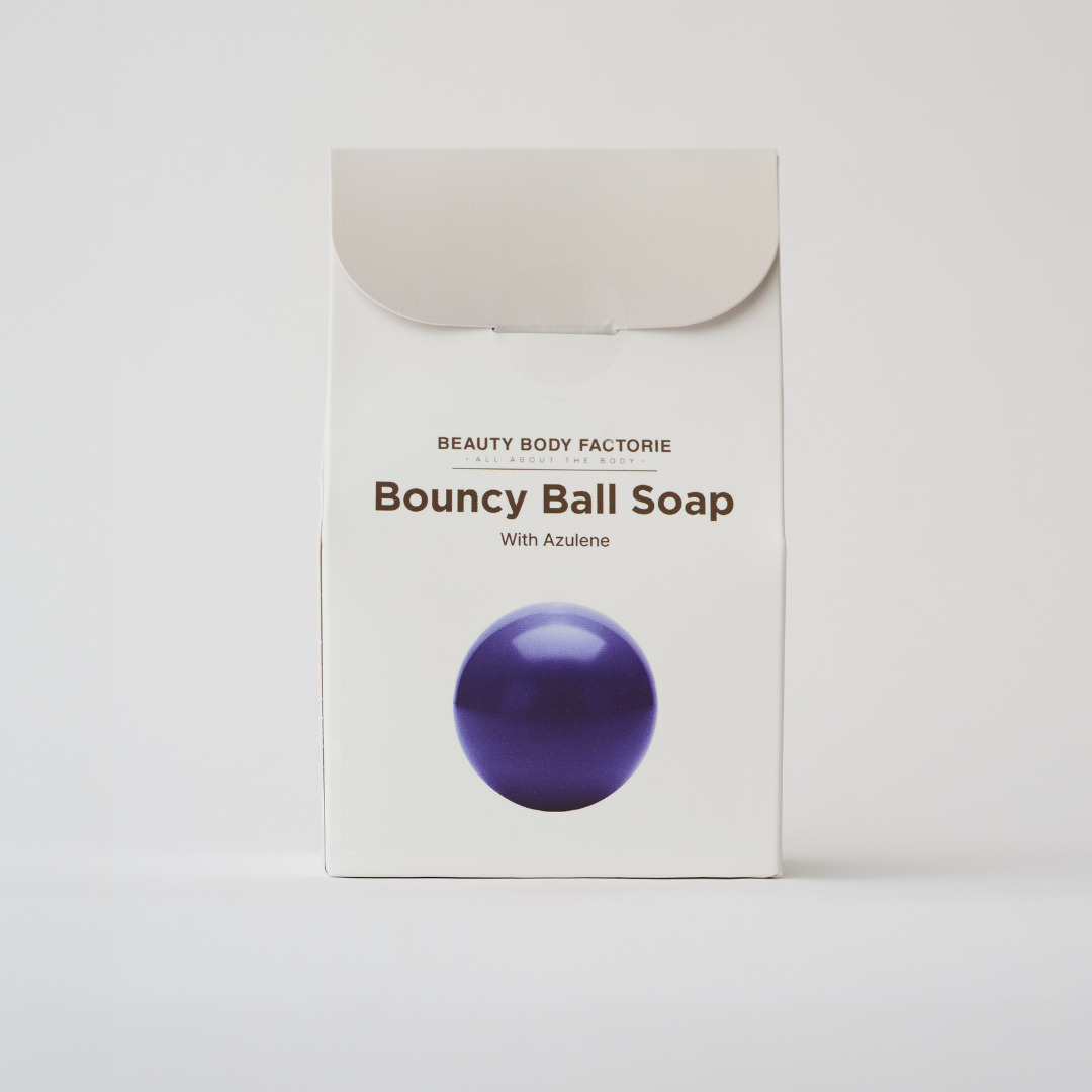 blue body soap in the shape of a ball in a box 