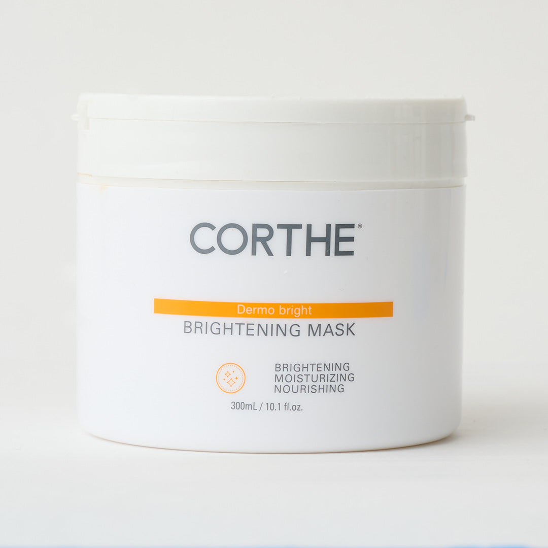 facial clay mask in white container

