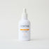 facial peel in a white bottle 