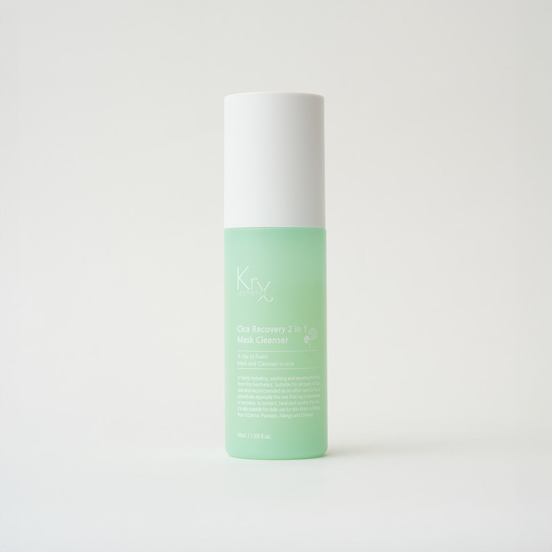 green bottle of skincare with a white top