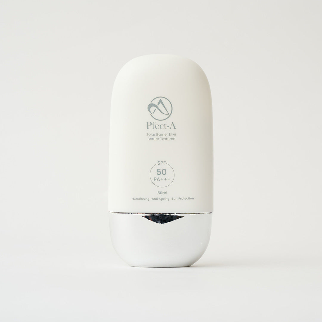 white bottle of spf with silver cap