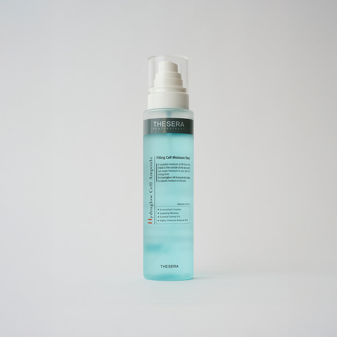 bottle of blue skincare liquid in a spray bottle 