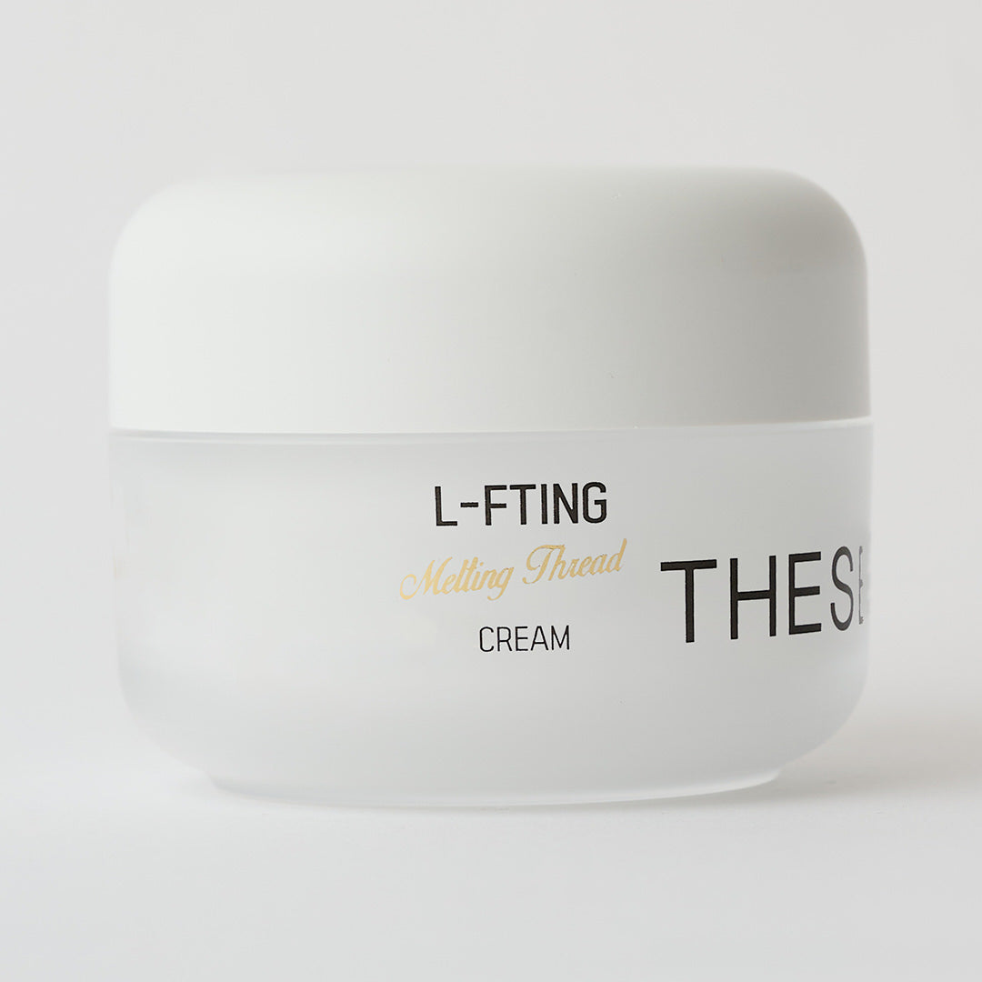 white skincare cream in a white container