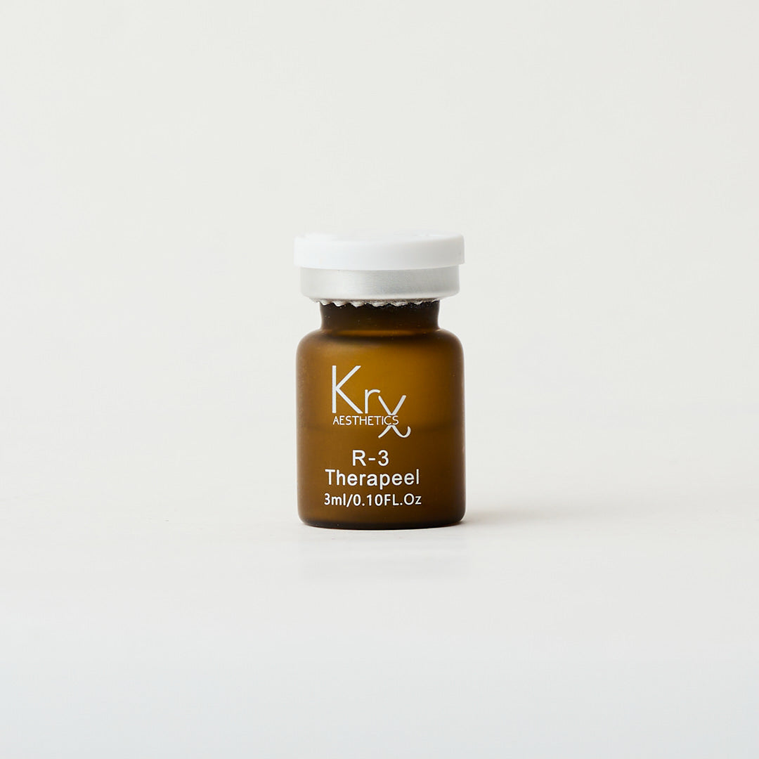 amber glass vial of skincare peel